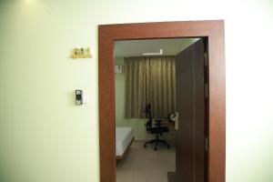 Postel nebo postele na pokoji v ubytování Novel Hotel