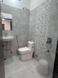 Koupelna v ubytování Hotel Simony Palace + 28 fotografií
