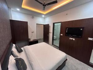 TV a/nebo společenská místnost v ubytování Hotel Simony Palace