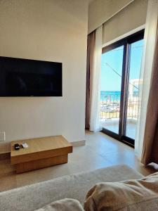 TV a/nebo společenská místnost v ubytování NAMI Seaside