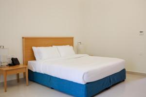 Assia Hotel客房内的一张或多张床位
