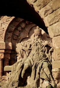 a statue of a man on the side of a building at RosenSuite SGH in Sangerhausen +7 photos