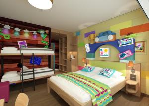 Postel nebo postele na pokoji v ubytování Hotel Legoland