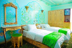 En eller flere senge i et værelse på HON SAROY - immerse atmosphere in the epoch of the khans