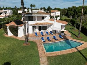 an aerial view of a house with a swimming pool at Vila Paraiso - Amazing villa in Carvoeiro