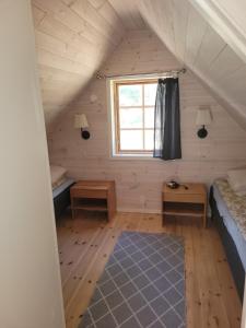 Postel nebo postele na pokoji v ubytování Fårö house + 4 fotografie