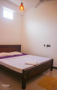 Postel nebo postele na pokoji v ubytování Mindana Residence