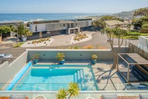 Πισίνα στο ή κοντά στο BALI SUITE in Camps Bay