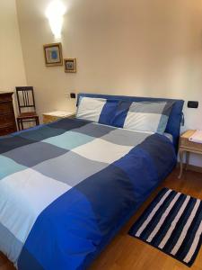 Postel nebo postele na pokoji v ubytování La Casa nel Borgo