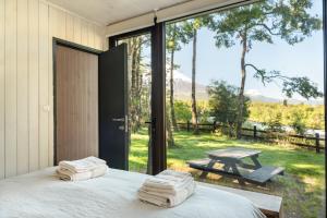 Aed väljaspool majutusasutust Carintia Cabins