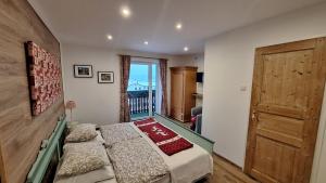 Una cama o camas en una habitación de Haus Hepi