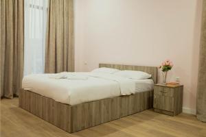 Ένα ή περισσότερα κρεβάτια σε δωμάτιο στο Panorama Hills Apart-Hotel