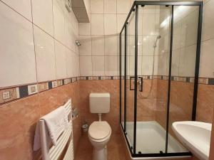 Koupelna v ubytování König Hotel