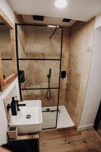Ein Badezimmer in der Unterkunft Maison Ubuntu