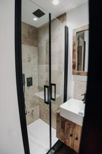 Ein Badezimmer in der Unterkunft Maison Ubuntu