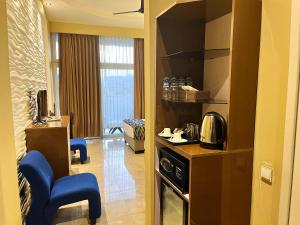 Kuchyň nebo kuchyňský kout v ubytování Aryana Queen Beach Resort