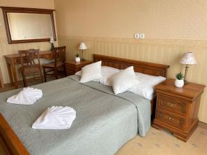 Postel nebo postele na pokoji v ubytování König Hotel