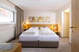 Voodi või voodid majutusasutuse Hotel Zirbenhof toas