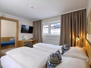 Voodi või voodid majutusasutuse Hotel Zirbenhof toas
