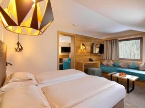 Voodi või voodid majutusasutuse Hotel Zirbenhof toas