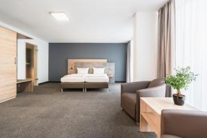 Posezení v ubytování PANORAMA HOTEL in Neustadt an der Weinstraße