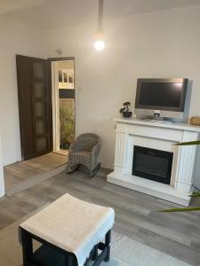 TV a/nebo společenská místnost v ubytování T2 dans Villa à Sorgues