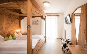 Postel nebo postele na pokoji v ubytování Boutique Pension Erlacher - Adults Only