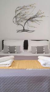 Posteľ alebo postele v izbe v ubytovaní Kalamia's cozy apartment