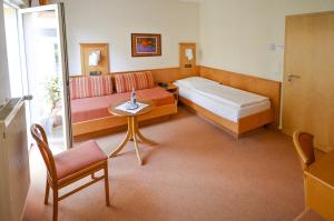 Postel nebo postele na pokoji v ubytování Hotel Felsenkeller