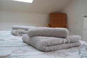 Katil atau katil-katil dalam bilik di Appartement vue mer exposé sud à Carantec