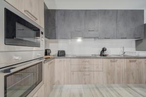 Eldhús eða eldhúskrókur á Relax & Unwind in Spacious Siggiewi Apartment by SF HOMES
