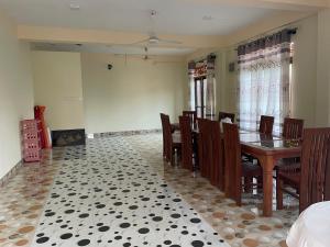 a dining room with a table and chairs at Saa in Anuradhapura +42 photos
