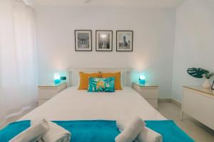 Postel nebo postele na pokoji v ubytování Renteando Albir Apartments