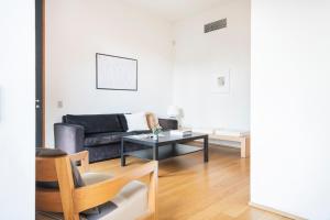 A seating area at Wonderful Brera flat