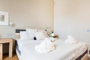 A bed or beds in a room at Wonderful Brera flat