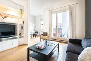 Televízia a/alebo spoločenská miestnosť v ubytovaní Wonderful Brera flat