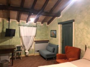 TV a/nebo společenská místnost v ubytování B&B il Fornello a Padernello