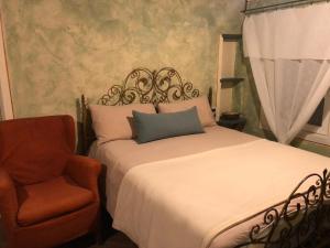 Postel nebo postele na pokoji v ubytování B&B il Fornello a Padernello