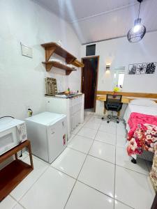 Postel nebo postele na pokoji v ubytování FLATS VASCONCELOS