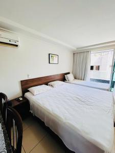 Postel nebo postele na pokoji v ubytování Blue Sunset 417