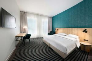 Postel nebo postele na pokoji v ubytování Park Inn by Radisson Brussels Centre Midi