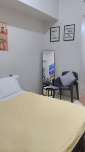 Vuode tai vuoteita majoituspaikassa Spacious Condo at Limketkai CDO
