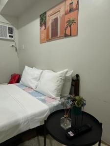 Vuode tai vuoteita majoituspaikassa Spacious Condo at Limketkai CDO