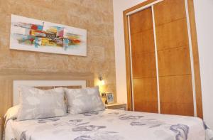 Łóżko lub łóżka w pokoju w obiekcie Chalet Sultan con piscina