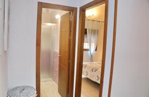 Łóżko lub łóżka w pokoju w obiekcie Chalet Sultan con piscina
