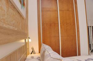 Łóżko lub łóżka w pokoju w obiekcie Chalet Sultan con piscina