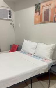 Vuode tai vuoteita majoituspaikassa Spacious Condo at Limketkai CDO