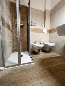 Koupelna v ubytování Albergo Al Pin