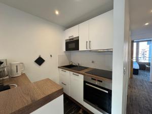 Η κουζίνα ή μικρή κουζίνα στο PLA134 - SUPERBE Appt 4-6pers traversant coeur val Claret