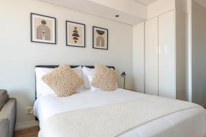 Postel nebo postele na pokoji v ubytování Cozy Stay at The Ellipse Waterfall + 26 fotografií